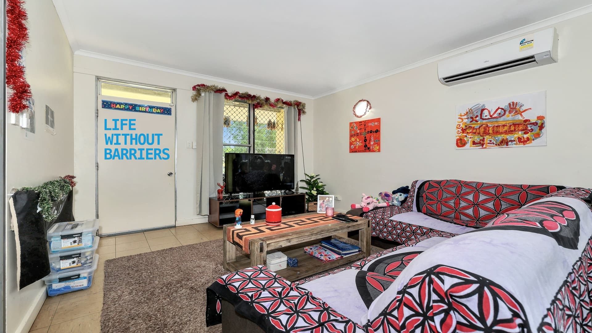 Lounge and TV 1 with logo