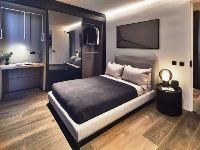 A bedroom of the four-bedroom home.