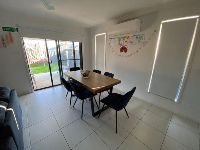 Open plan living area with dining room and living room