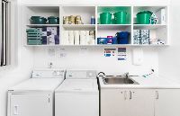 0a8ad3fa 7fa2-43ab-a400-b33e590833e6-lg-SIL043_LR_Maryland_shared-laundry_2