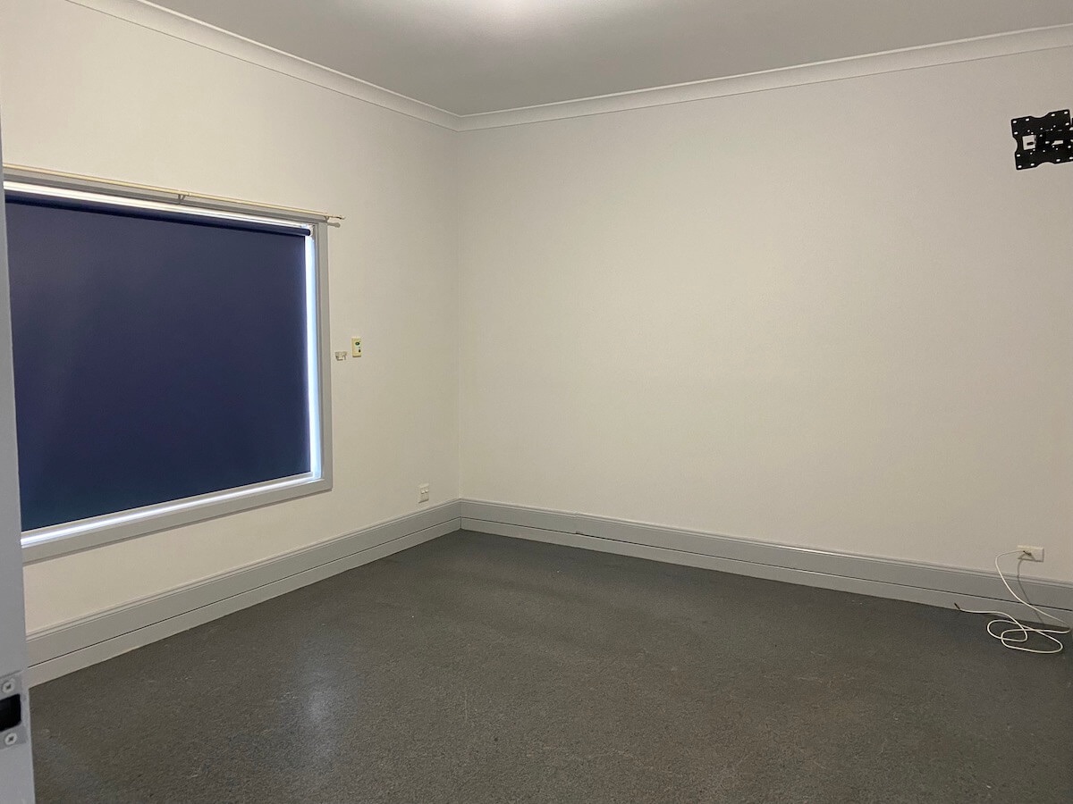 Bedroom with blinds down