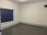 Bedroom with blinds down